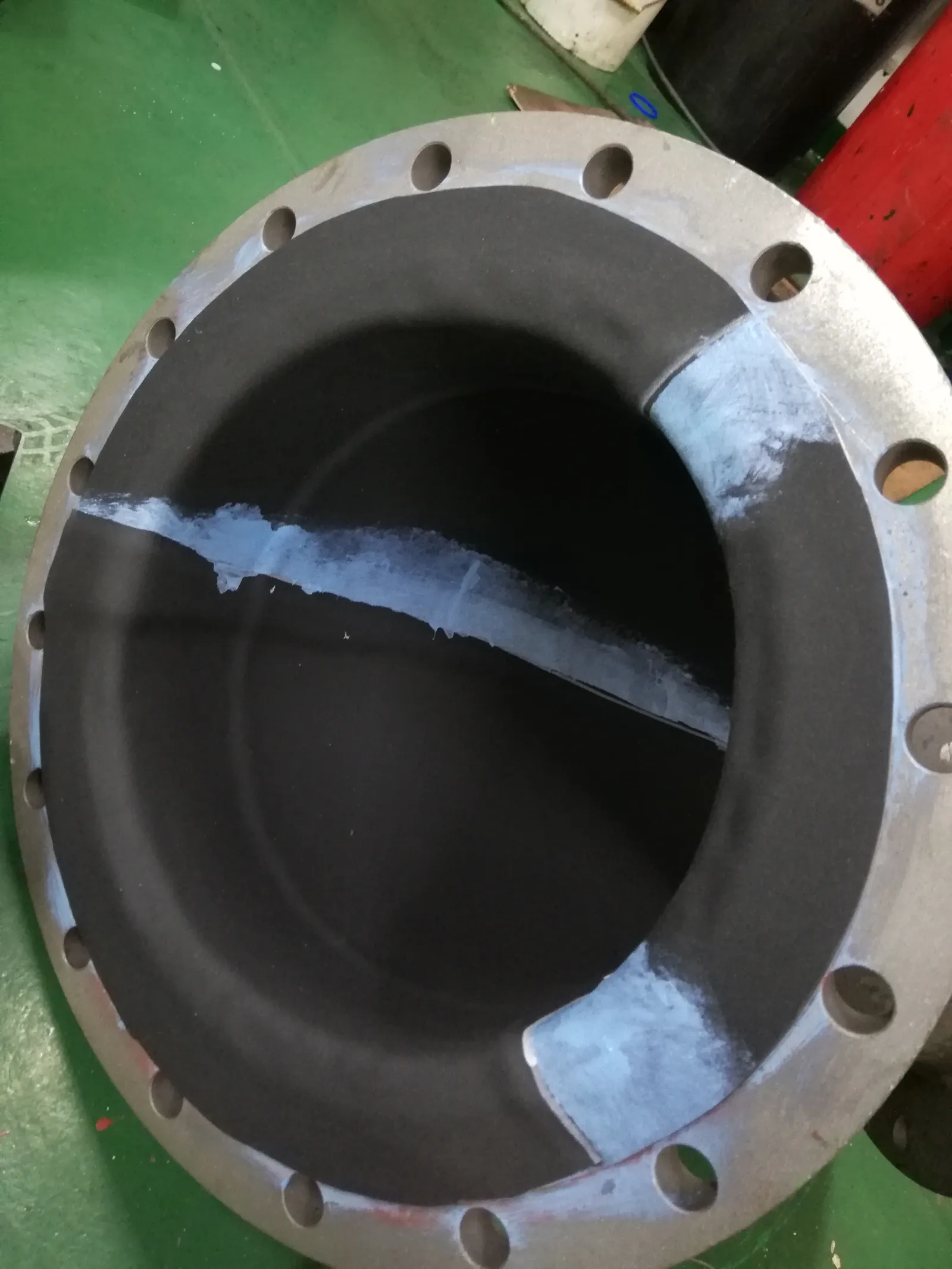 Rubber-lined pipe flange