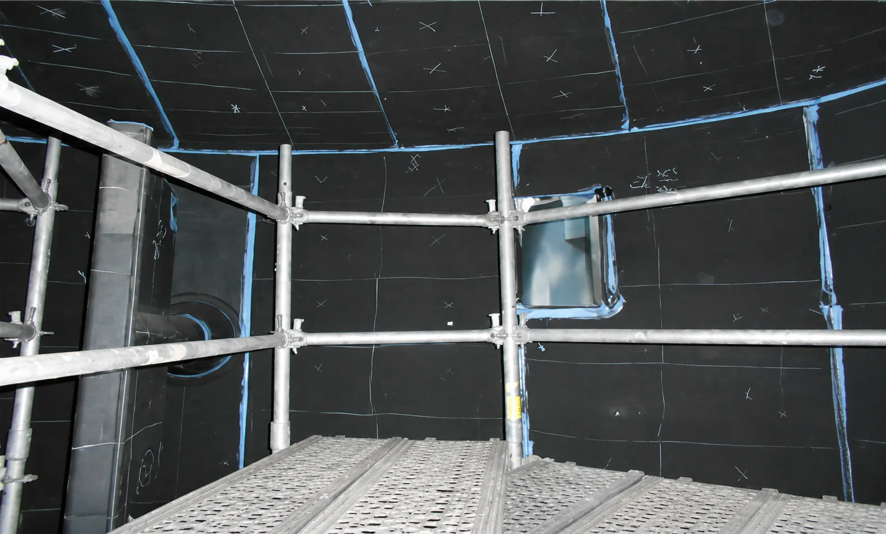 Rubber-lined tank interior with working scaffold